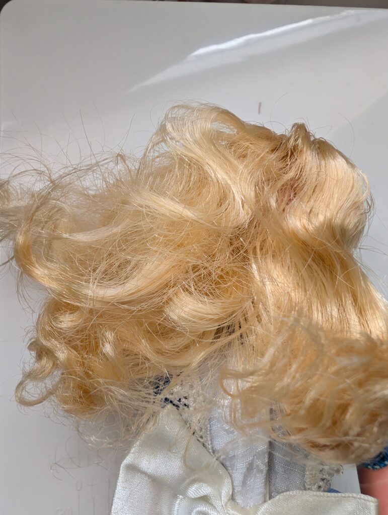 Doll with matted hair